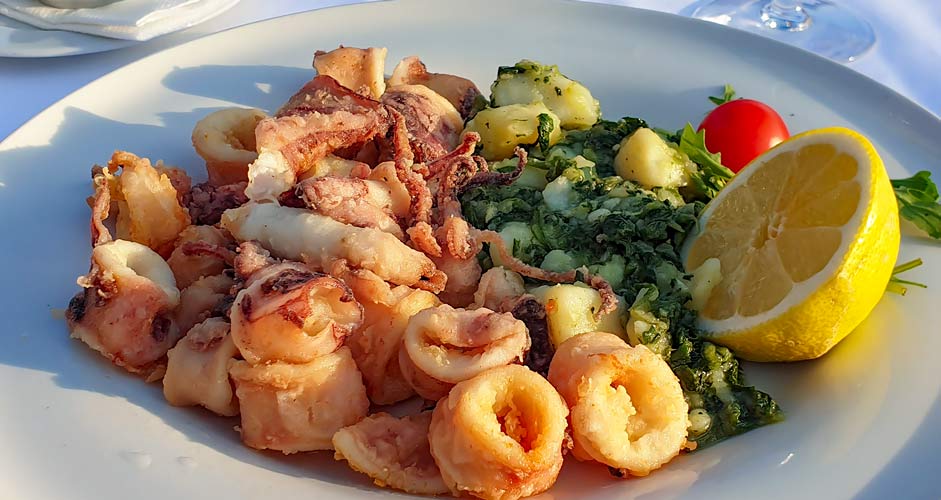 Fried squid and potatoes with Swiss chard