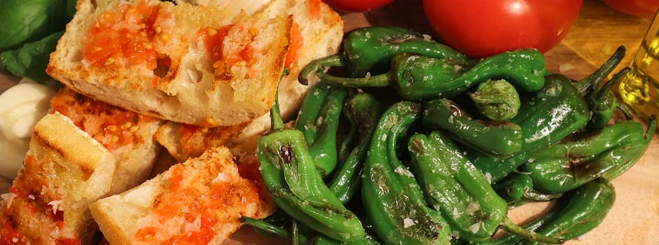 Tomato bread and Pimientos de Padrón